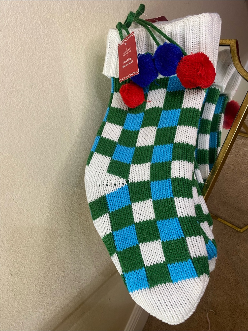 Ashland Knit Checkerboard Stockings (3) with Red and Blue Pom-Poms